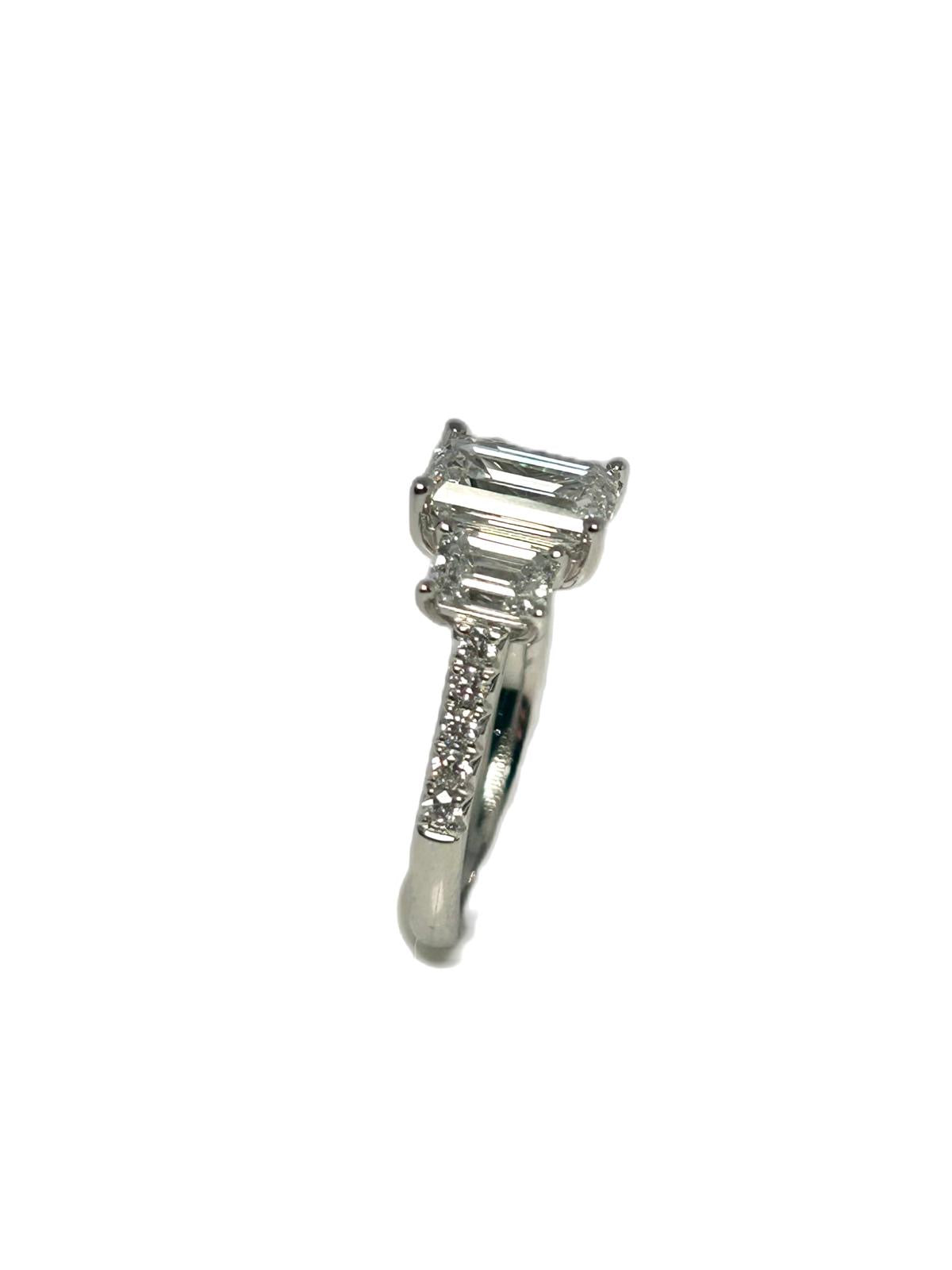 Lab diamond 3.30ct emerald cut trilogy ring