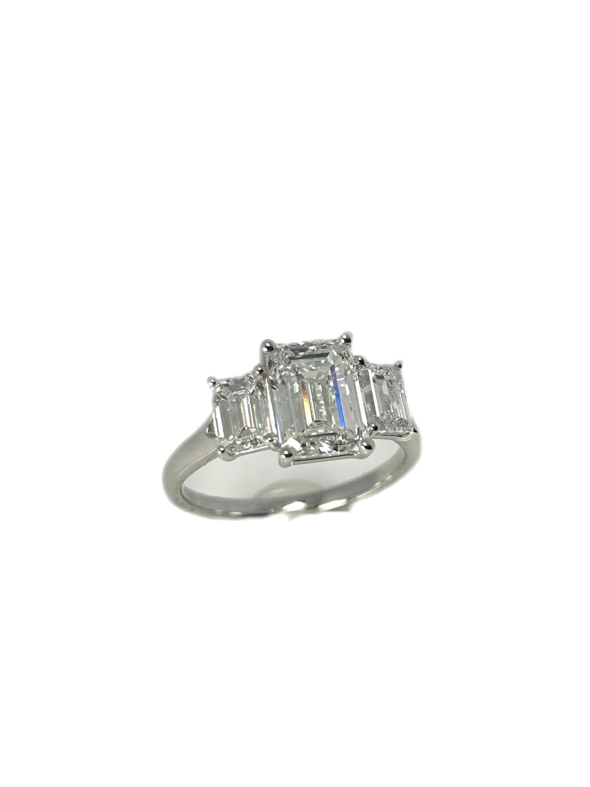 Lab diamond 3.07ct emerald cut trilogy ring