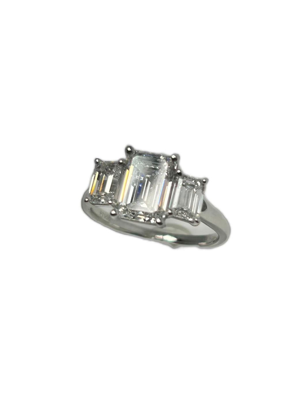 Lab diamond 3.07ct emerald cut trilogy ring