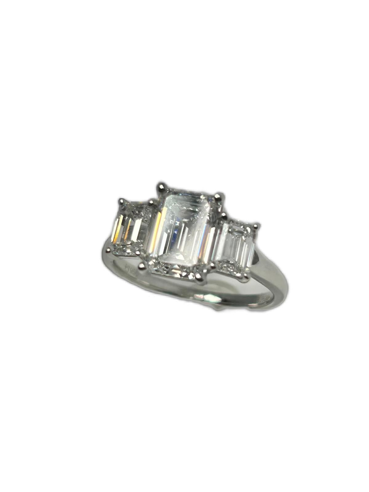 Lab diamond 3.07ct emerald cut trilogy ring