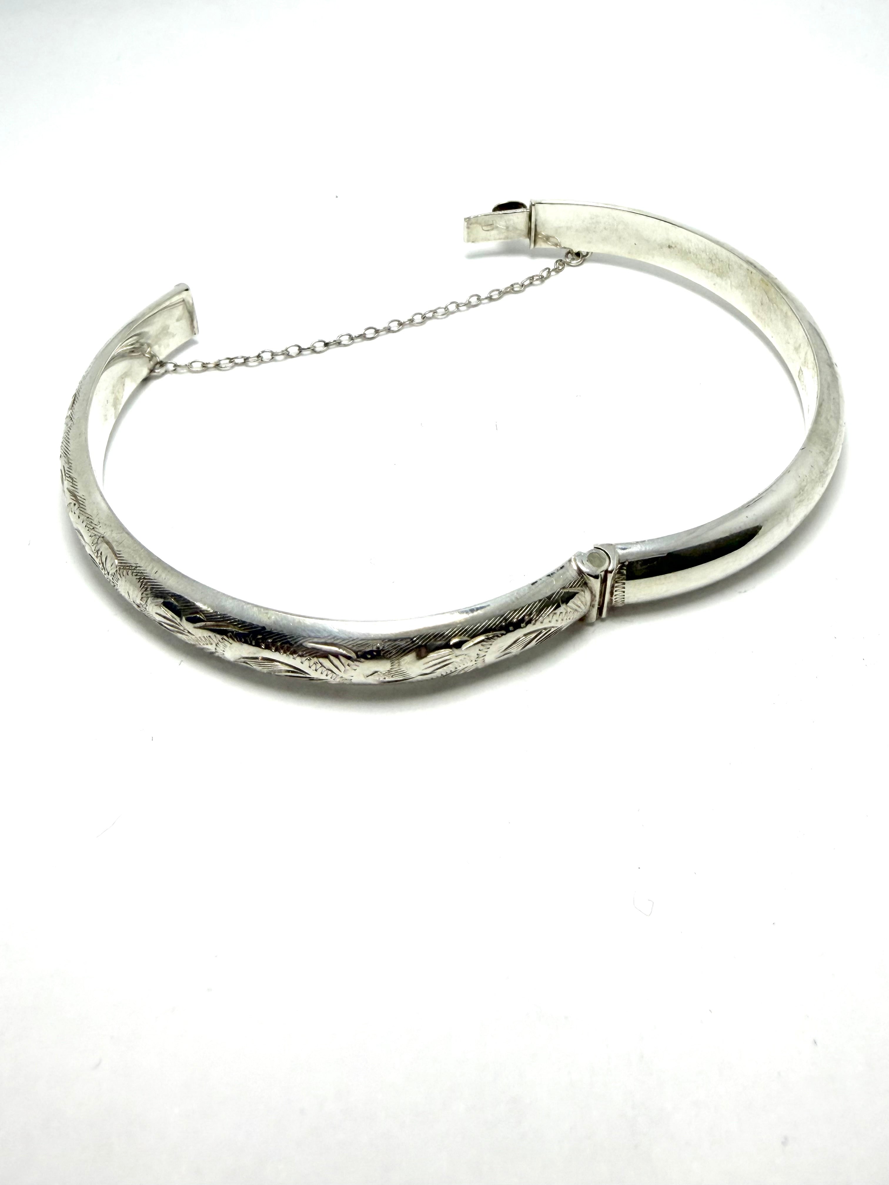 Silver half bangle leaf design
