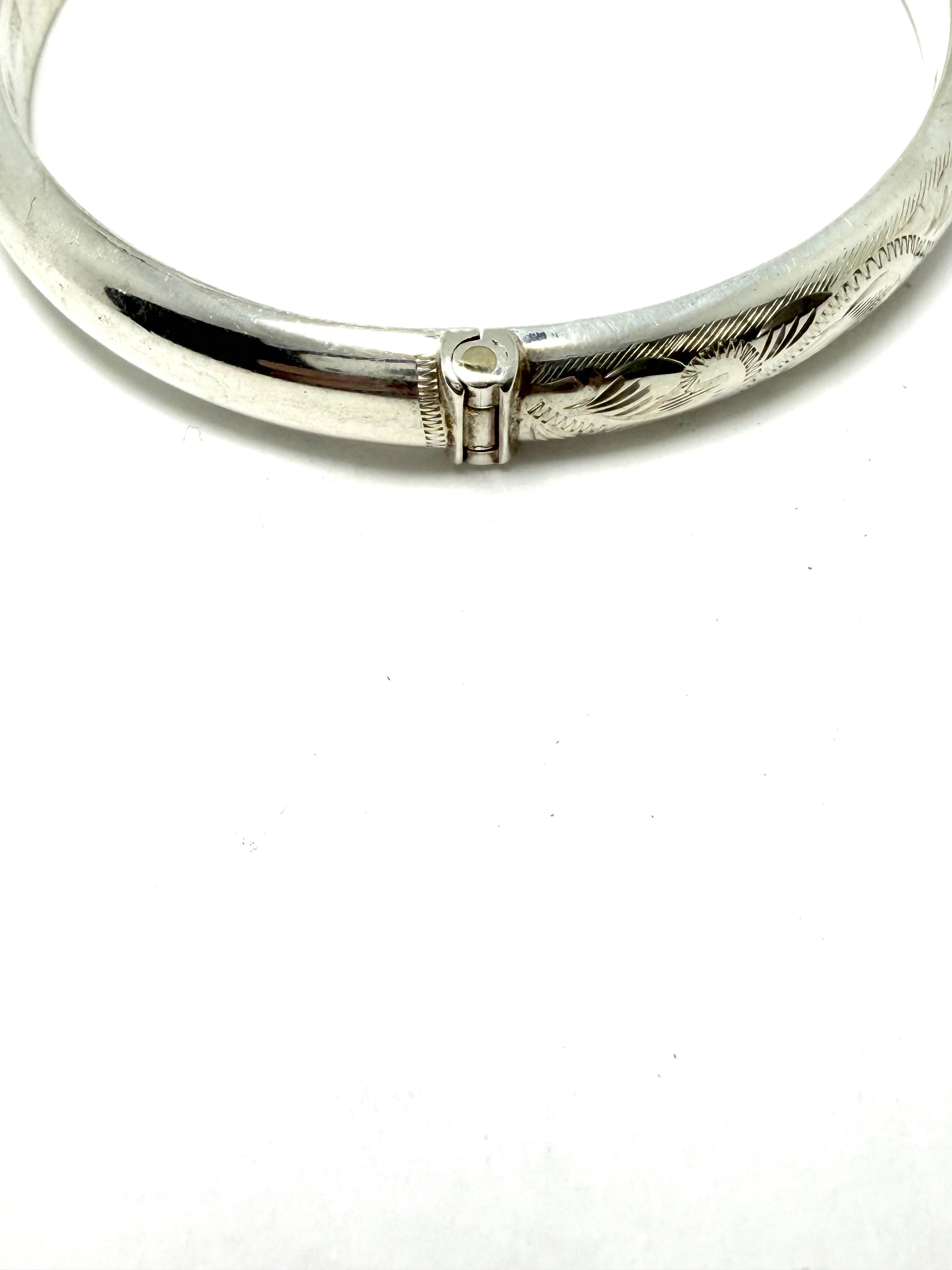Silver half bangle leaf design