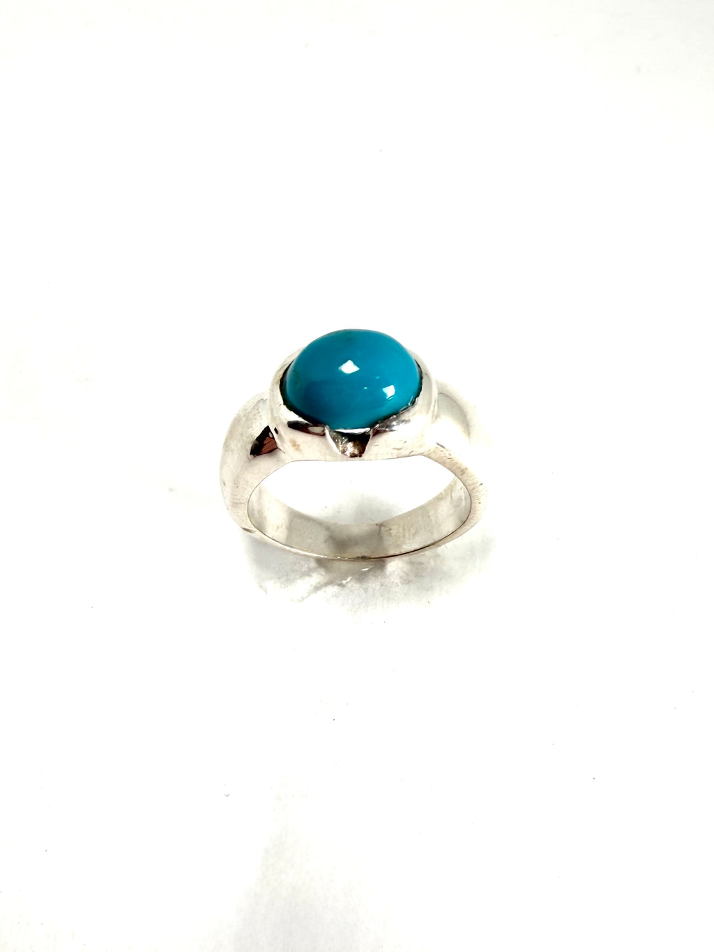 Silver ring with blue gemstone