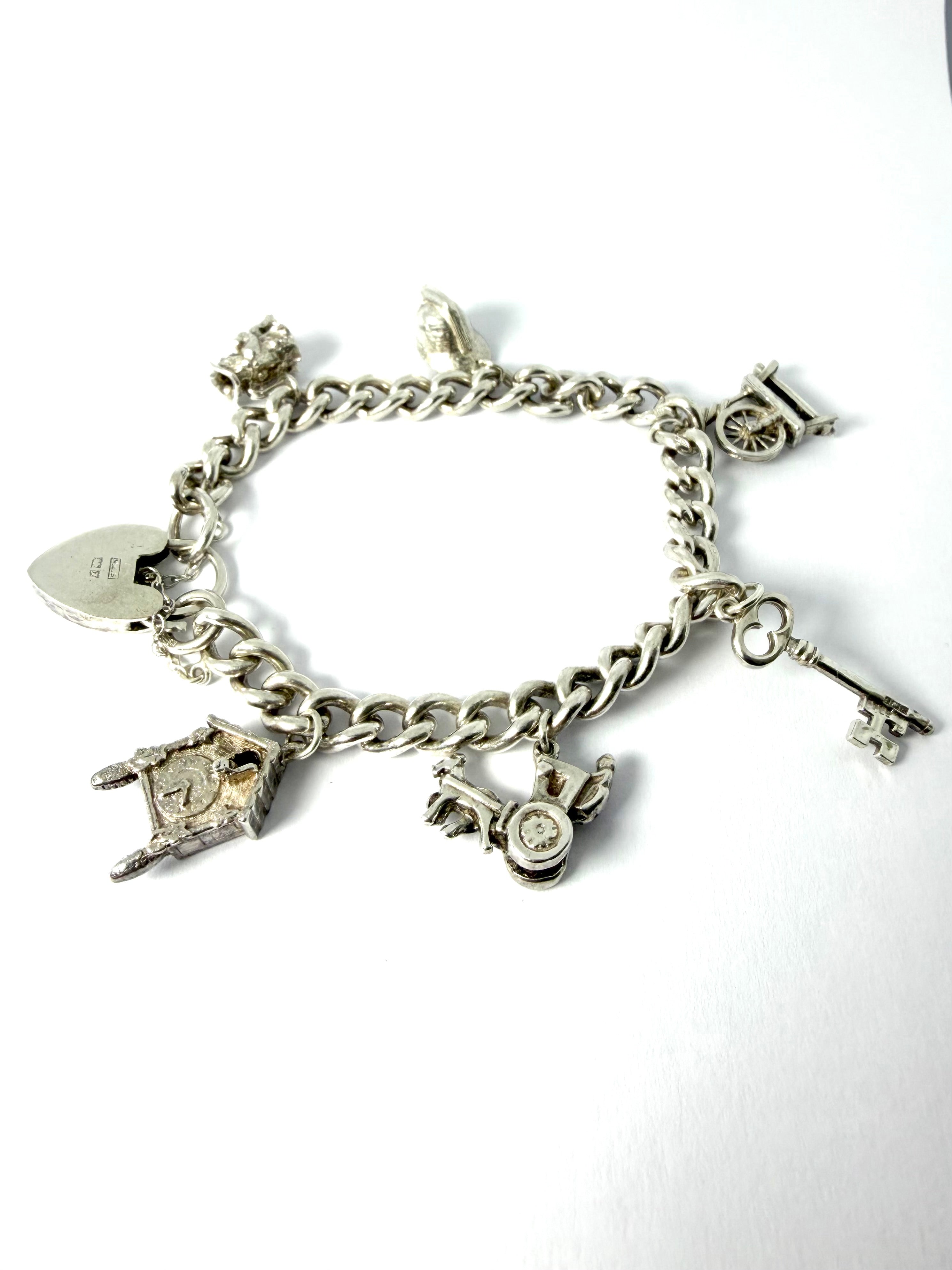 Solid silver charm bracelet
