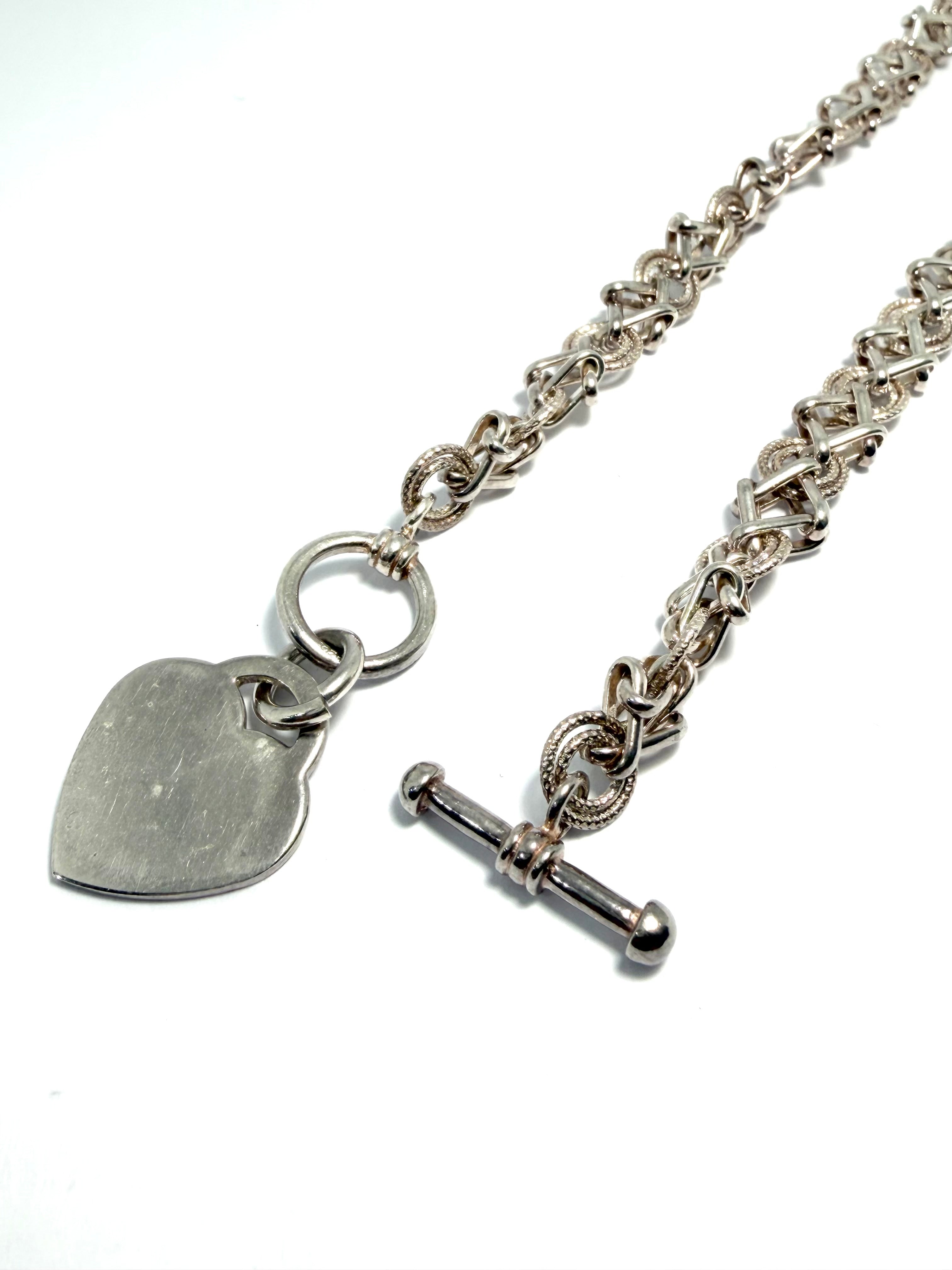 Silver chain with heart tag
