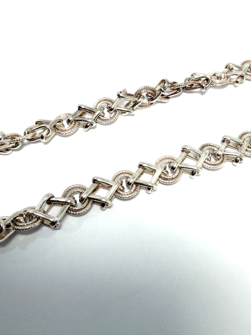 Silver chain with heart tag