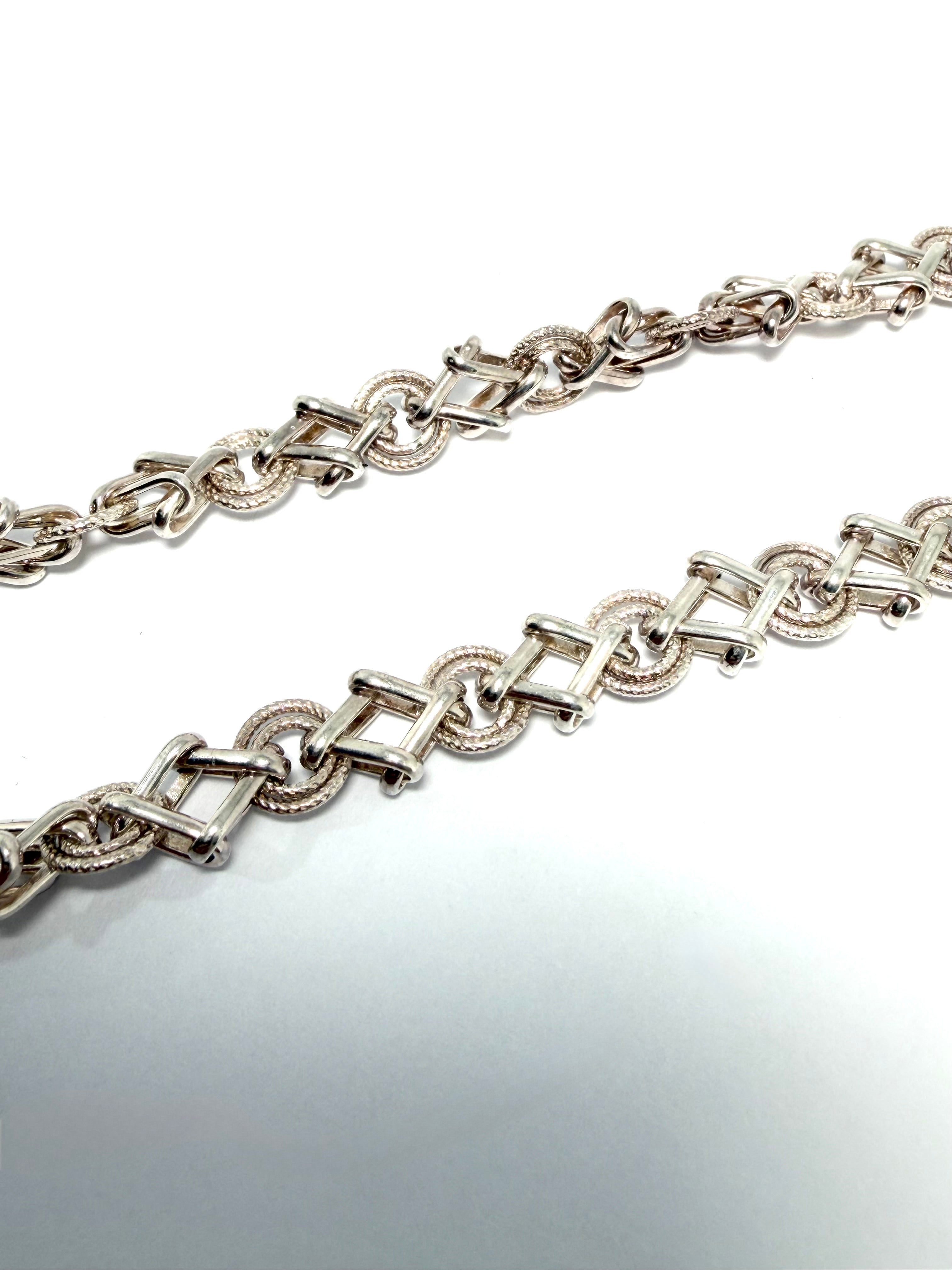 Silver chain with heart tag
