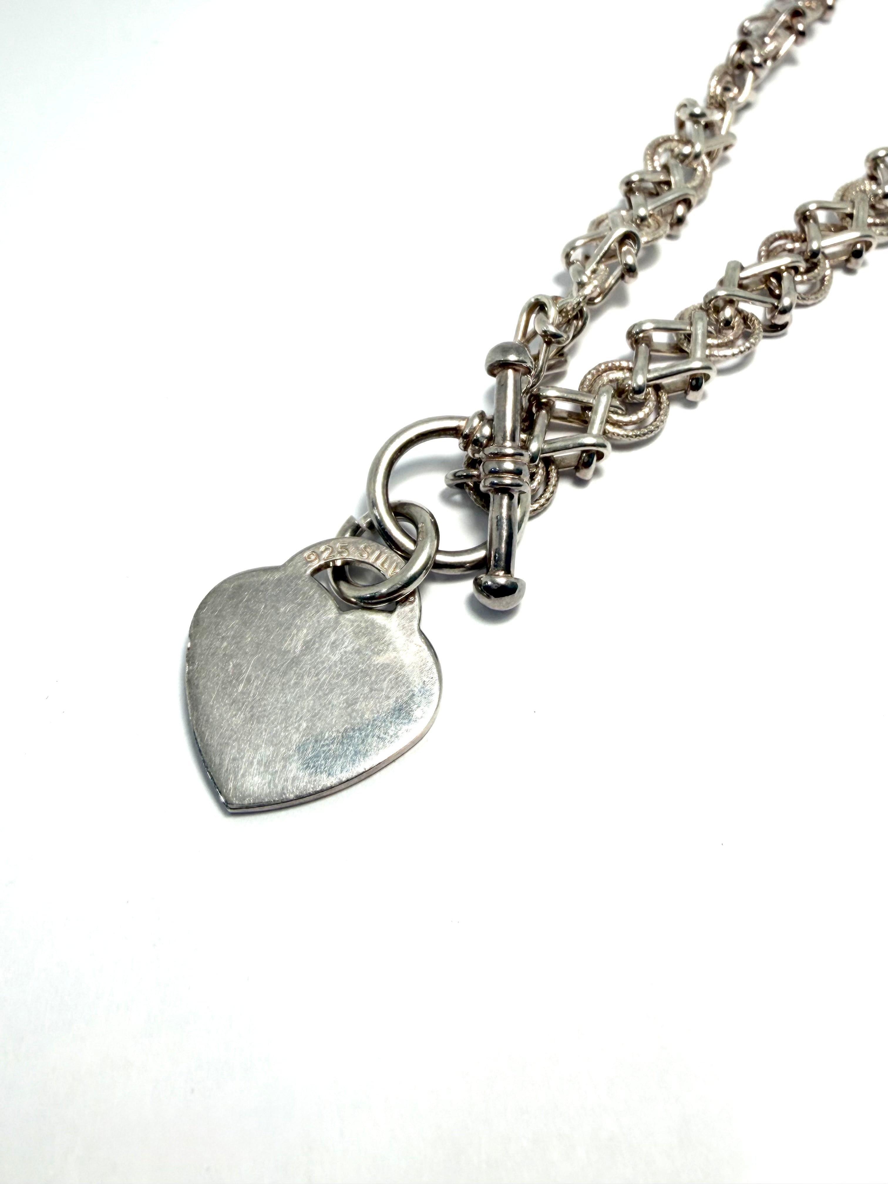 Silver chain with heart tag