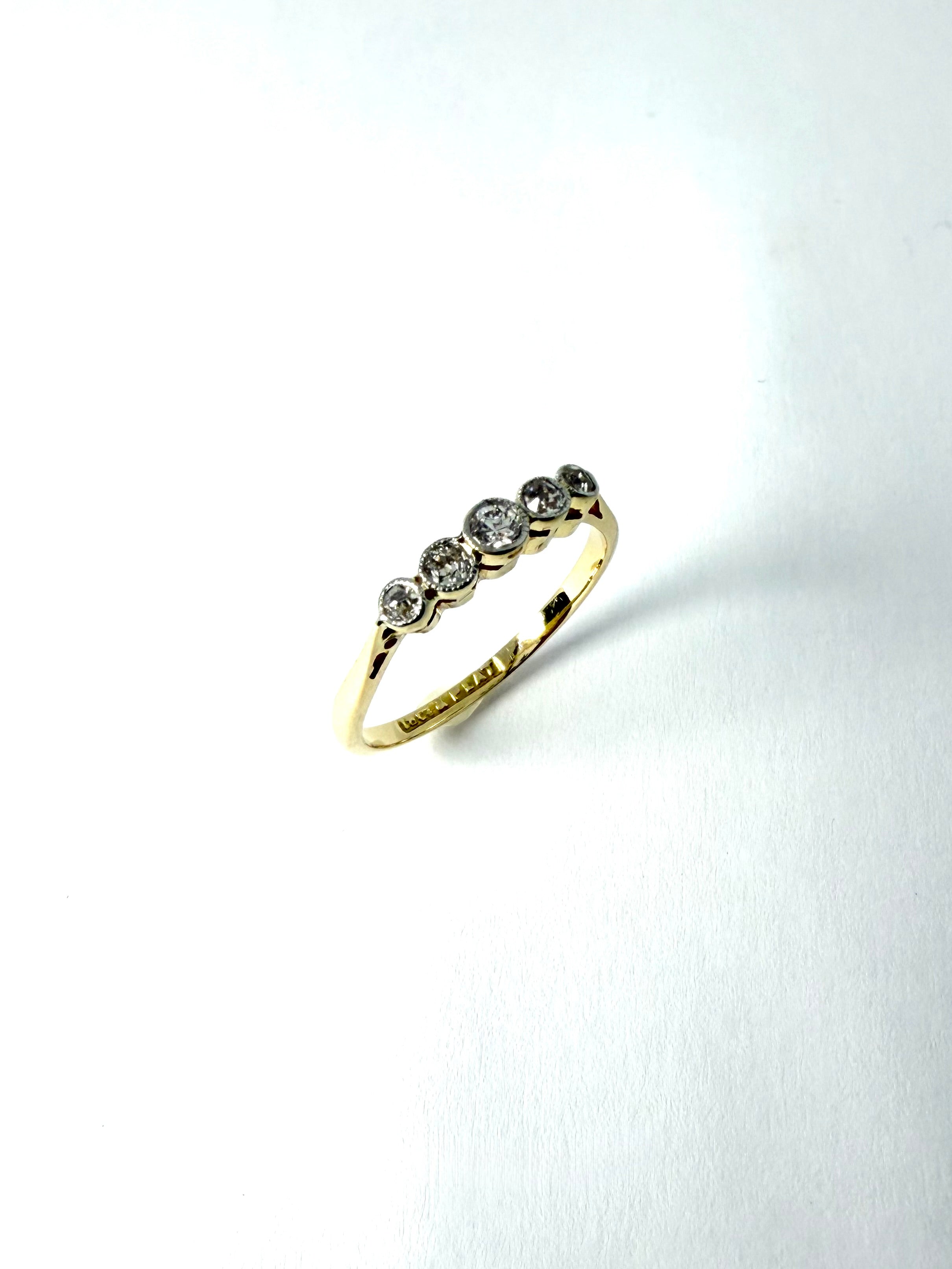 18ct 25pt rubover diamond ring