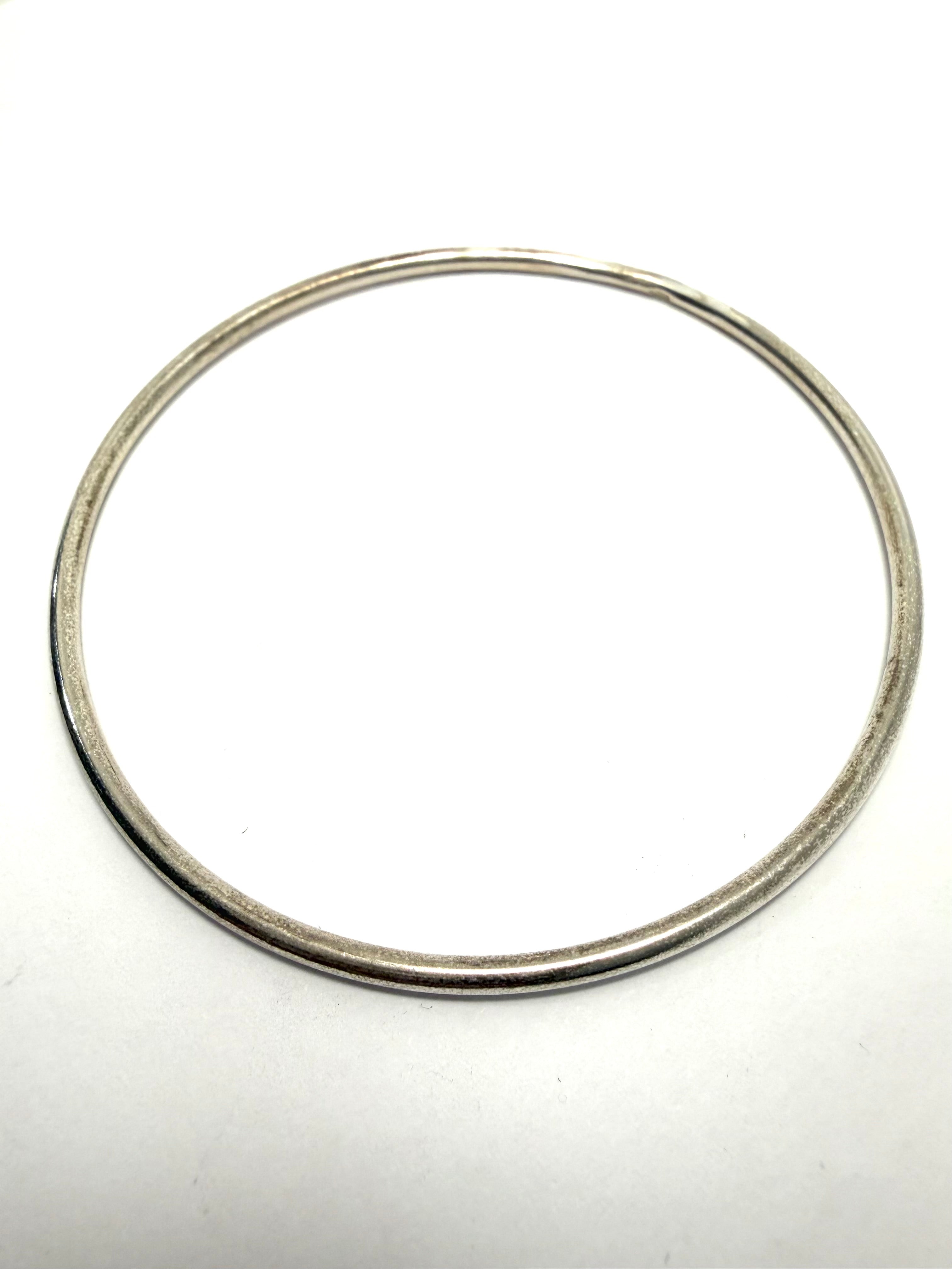 Silver slave bangle