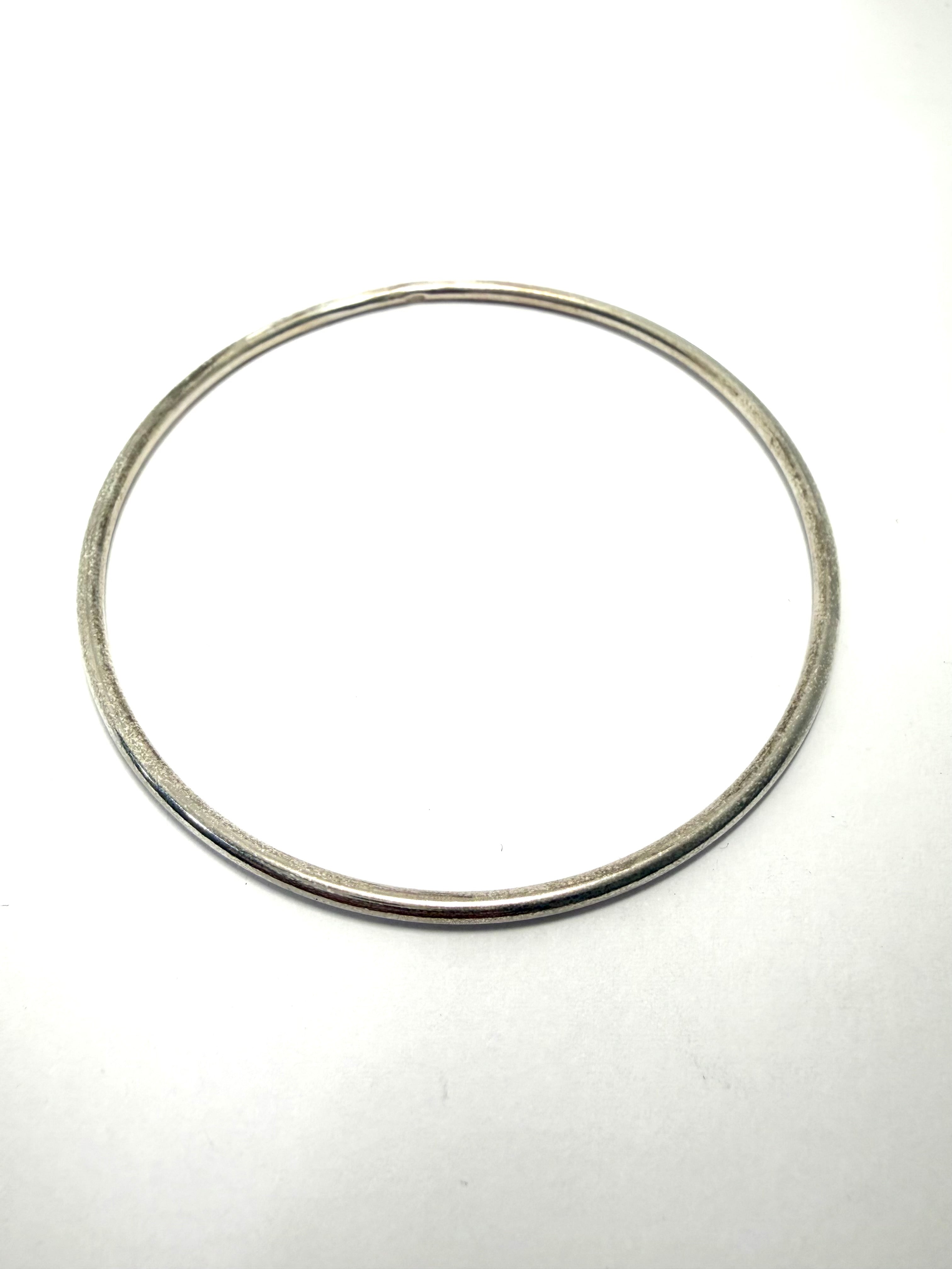Silver slave bangle