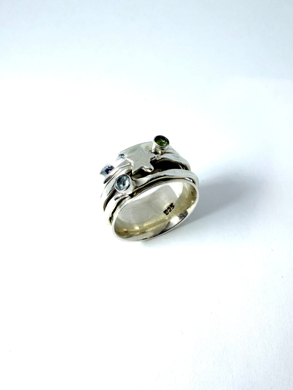 Silver spinning star ring