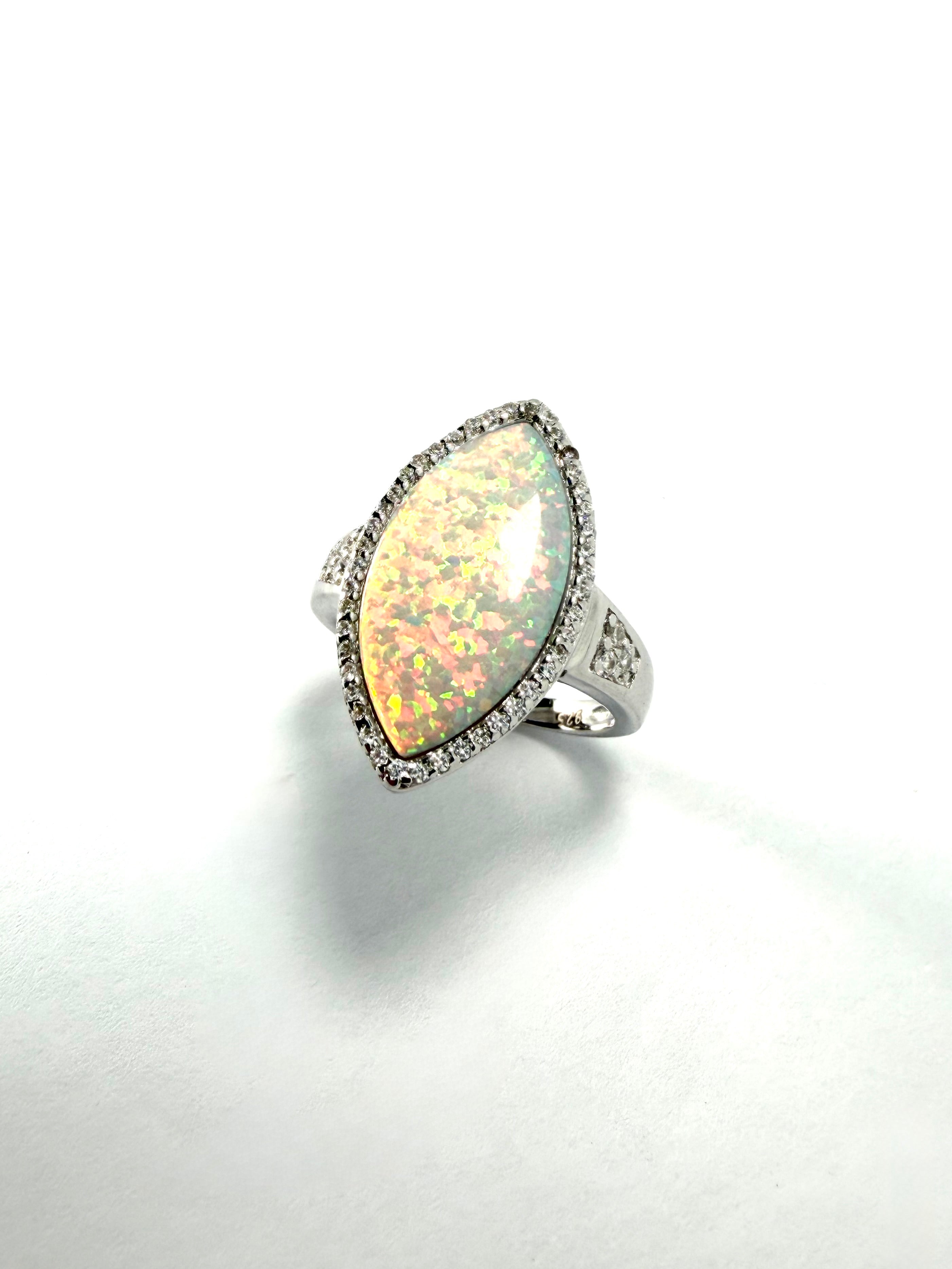 Silver synthetic opal and cz ring