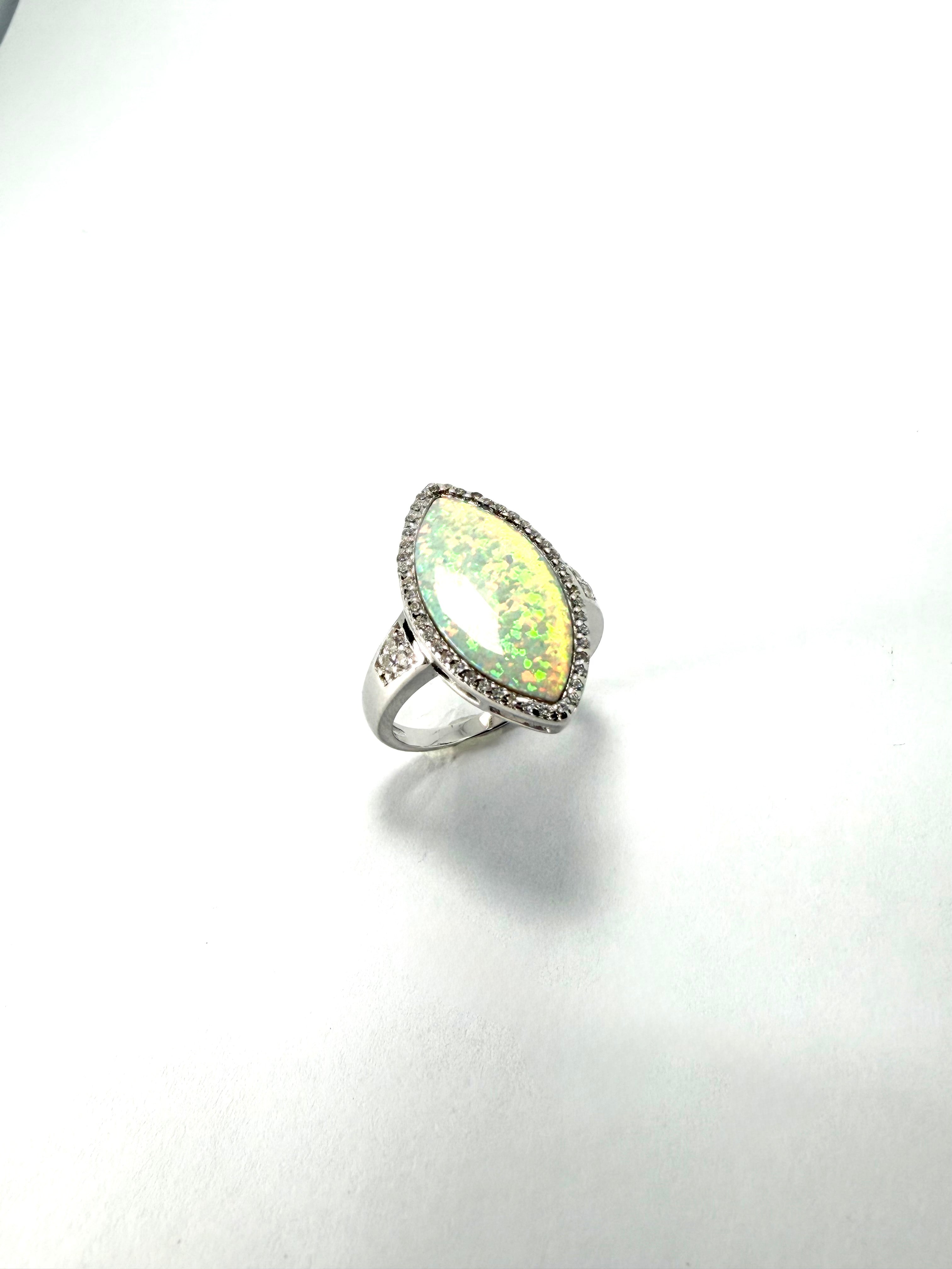 Silver synthetic opal and cz ring