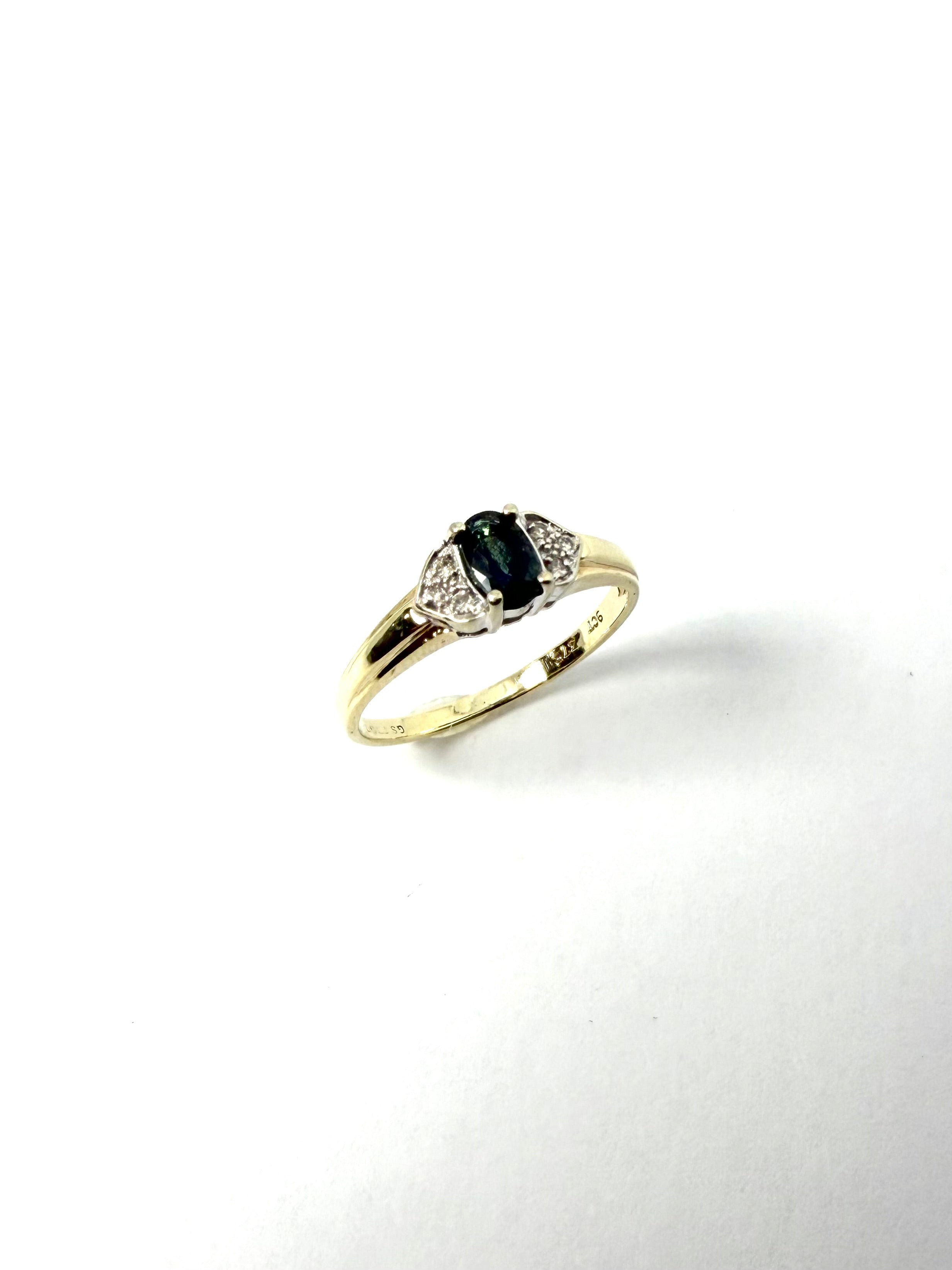 9ct teal sapphire and diamond ring