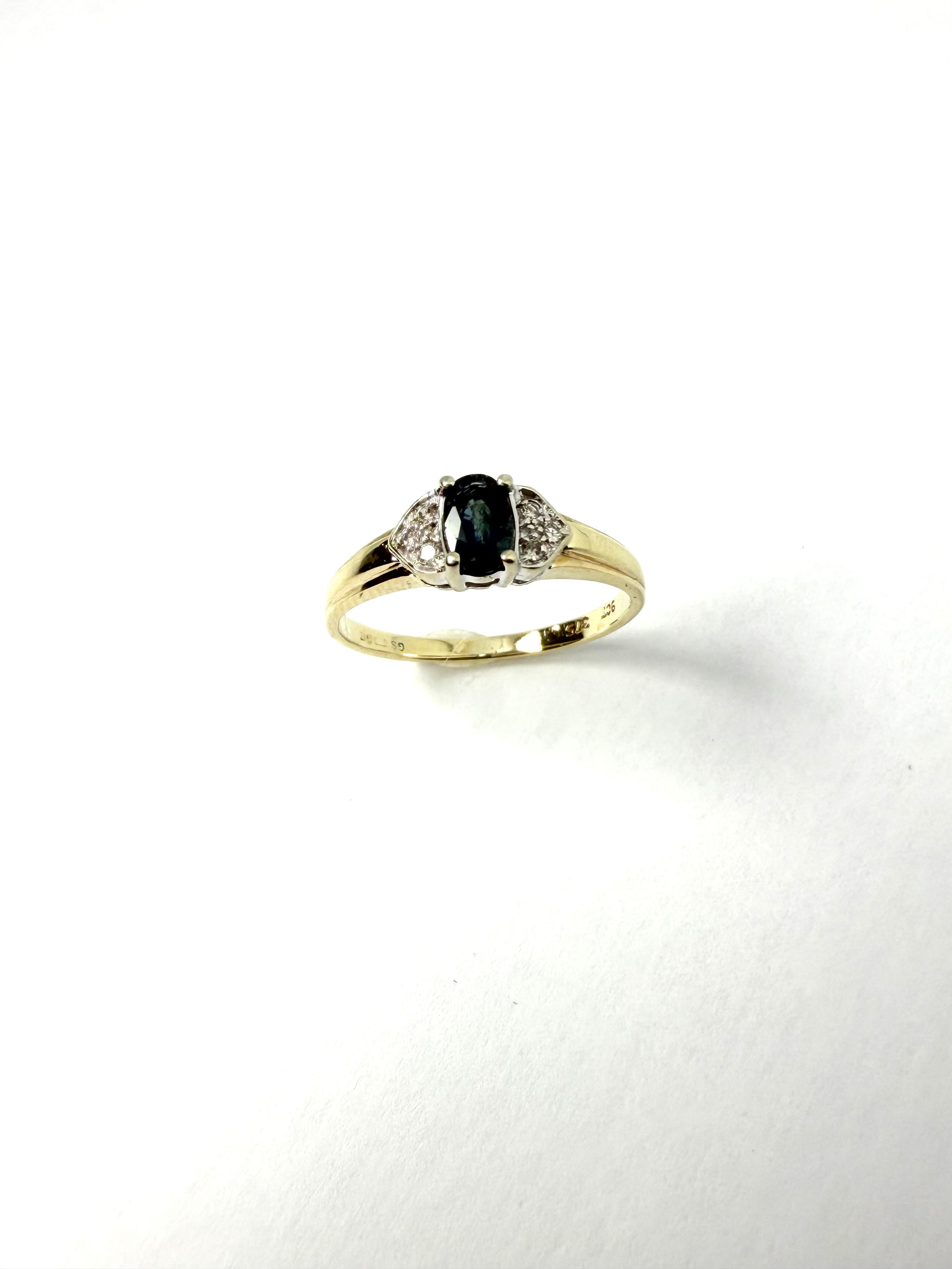 9ct teal sapphire and diamond ring