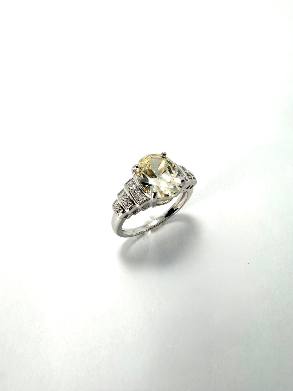 Silver oval yellow cubic zirconia ring