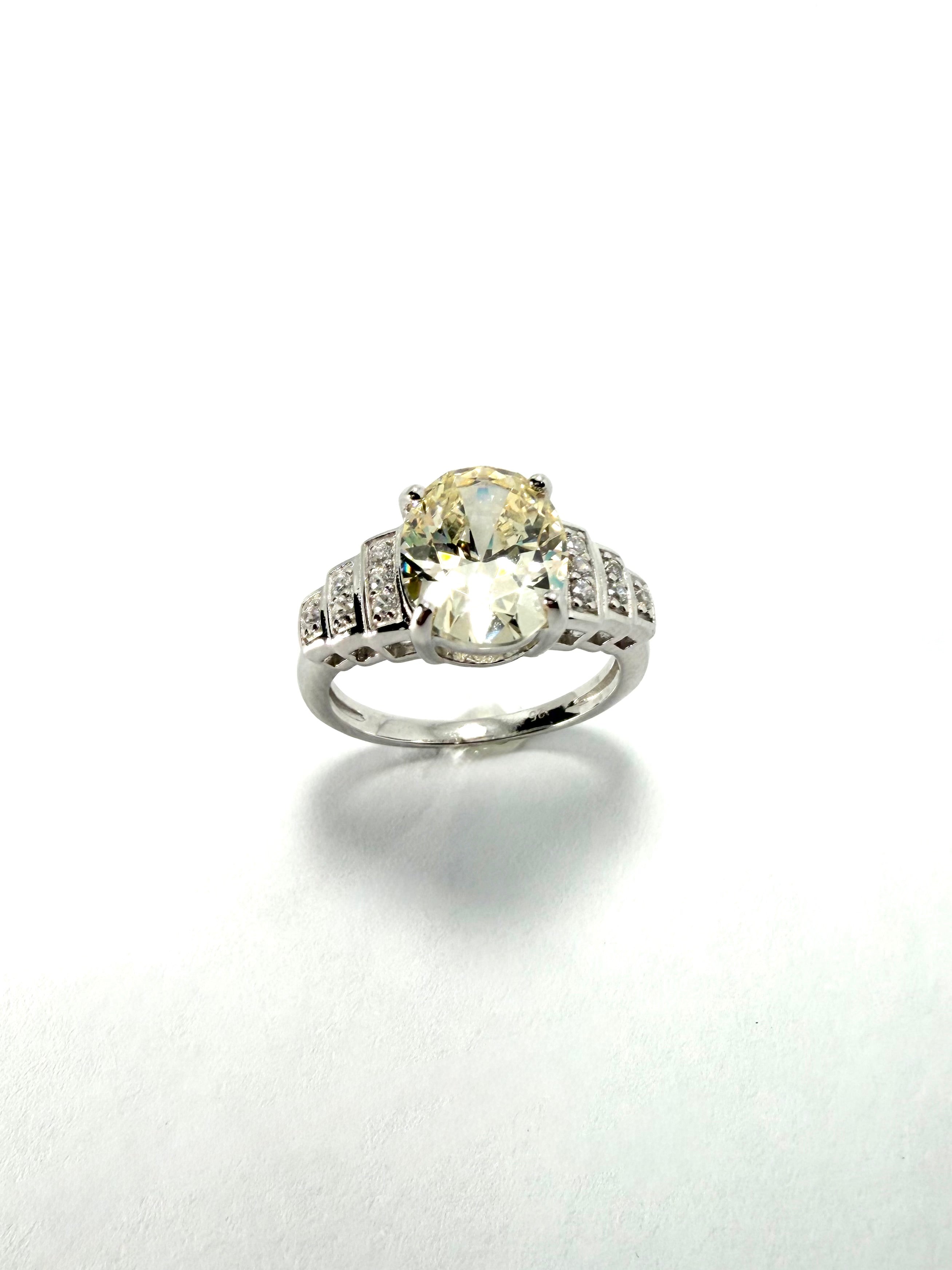 Silver oval yellow cubic zirconia ring